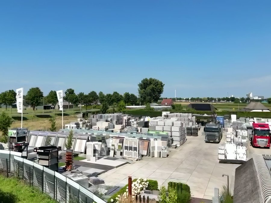 Het buitenterrein met pallets bestrating tot aan de horizon